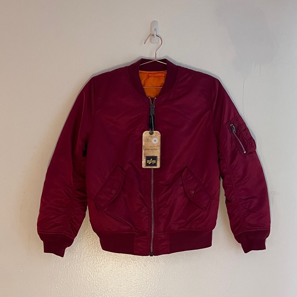 Alpha Industries Red/ bright Orange reversible bomber women’s size Medium
